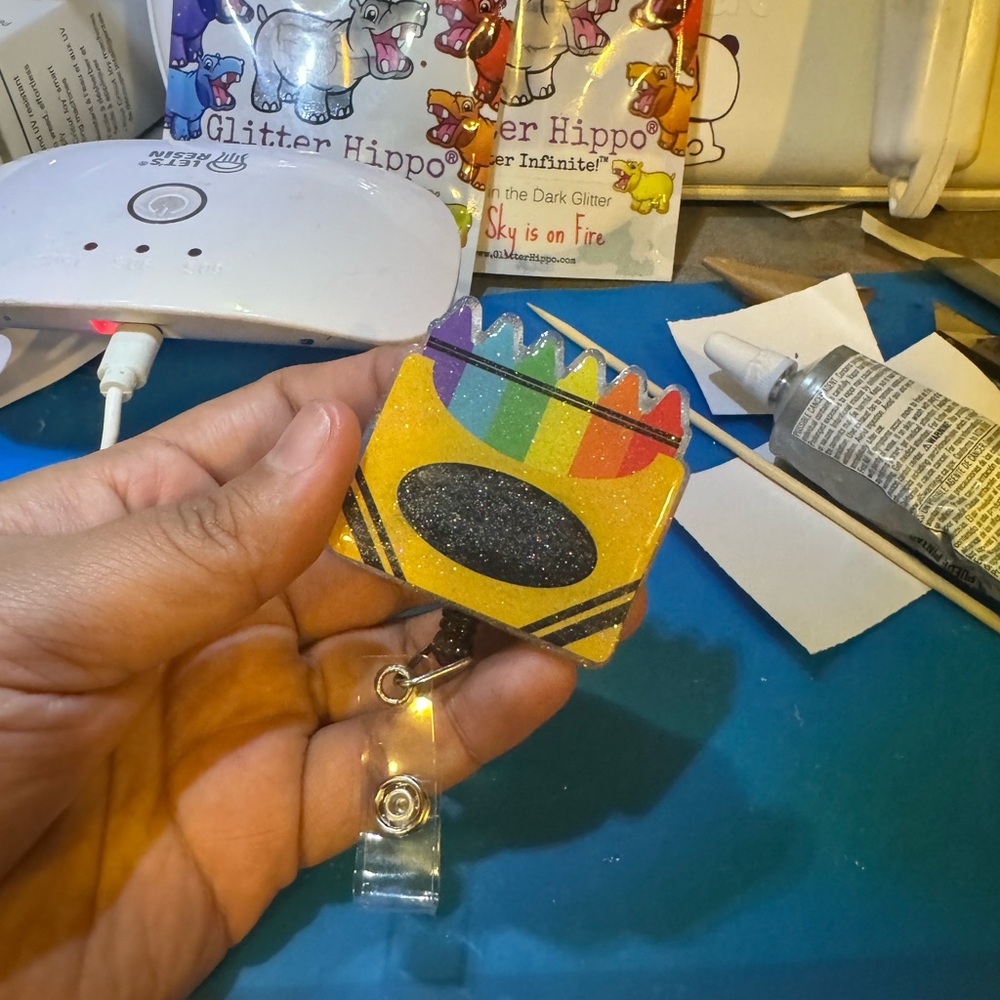 Crayon box badge reel